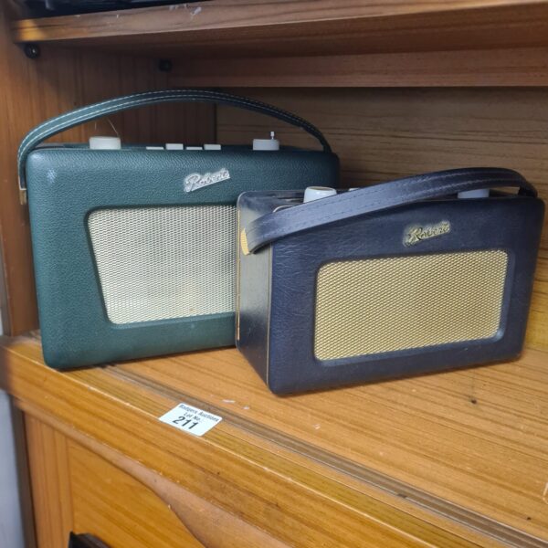 Pair of vintage Roberts radios in green, collectible retro electronics.