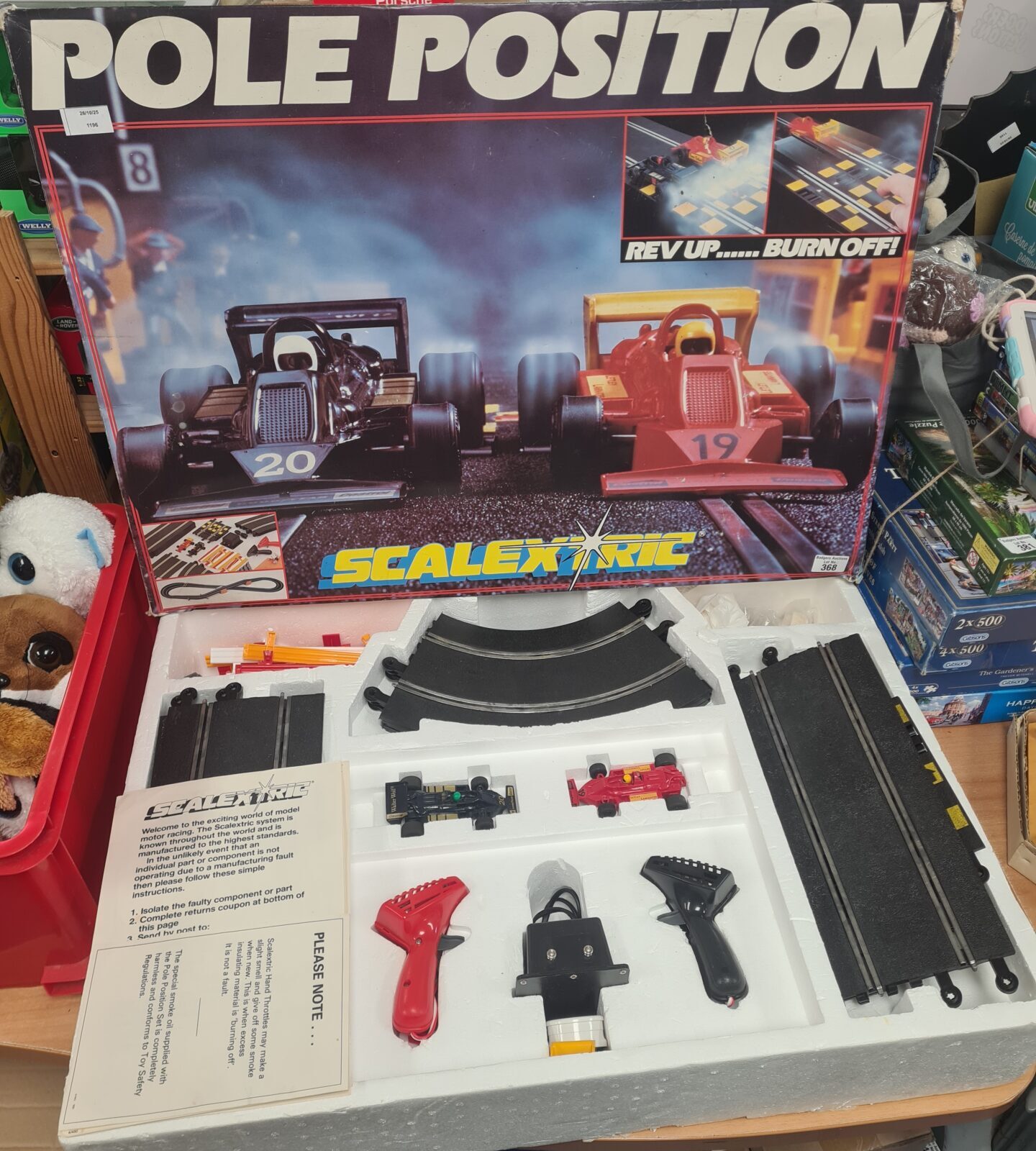 Vintage Scalextric race track set for miniature car racing.