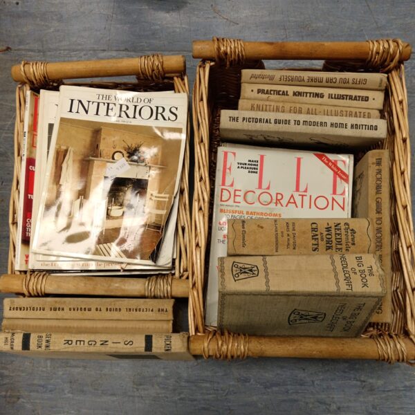 Vintage sewing and needlecraft books with Elle magazine cover.