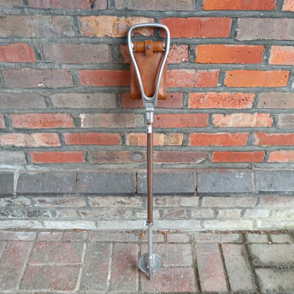 Vintage leather seated shooting stick for game bird hunting.