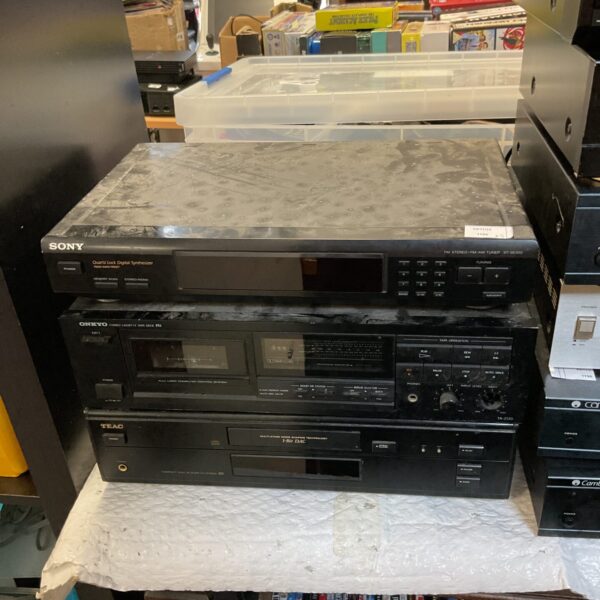 Vintage stereo system with Sony tuner, Onkyo cassette deck, and TEAC CD player.