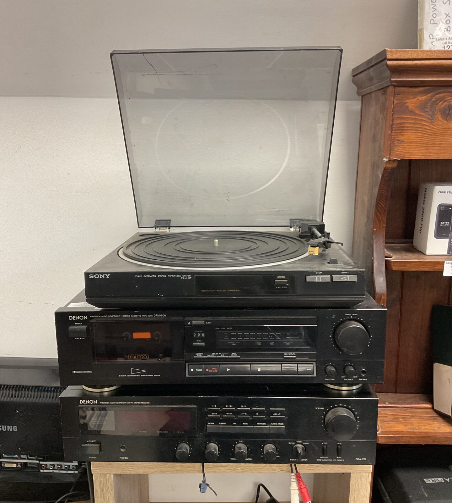 Vintage stereo system with Sony turntable, Denon cassette deck, and receiver.