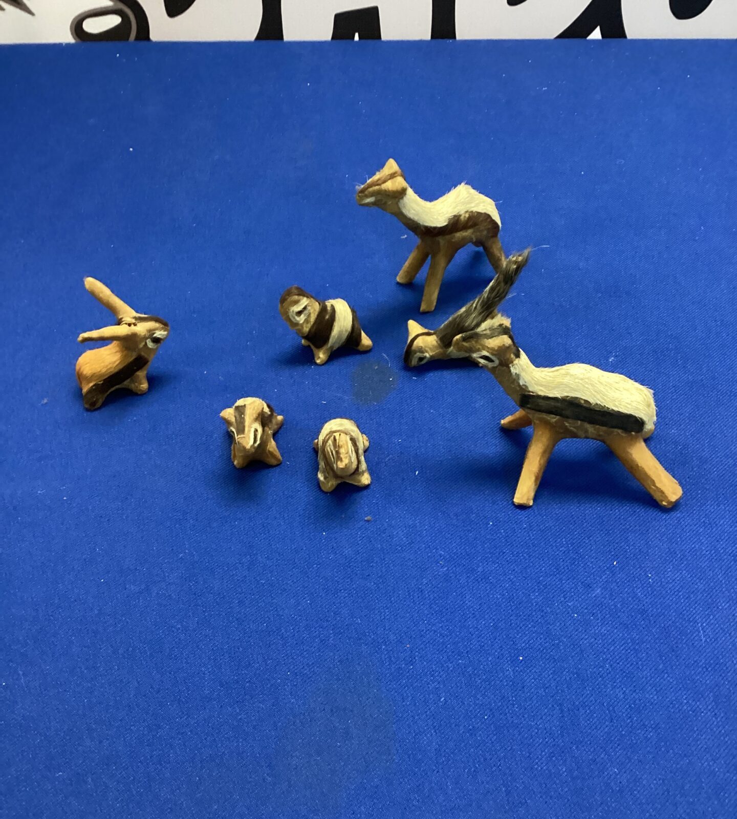 Vintage taxidermy animal figures, unique collectible folk art.