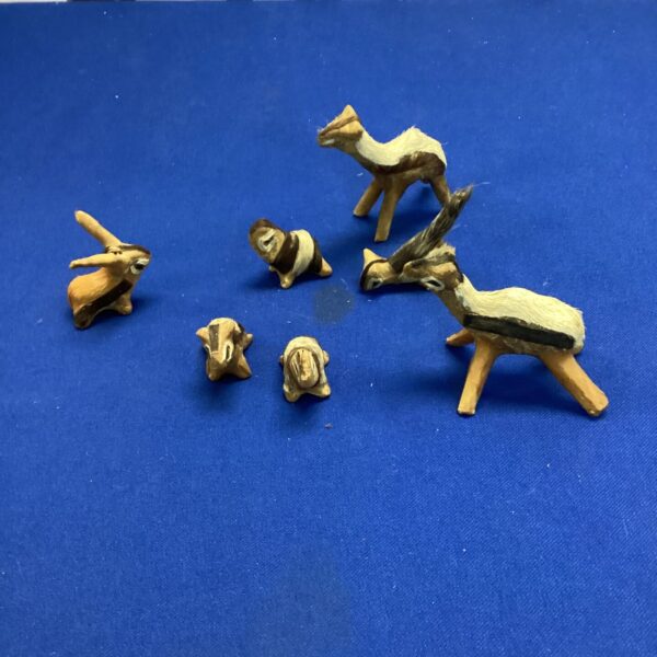 Vintage taxidermy animal figures, unique collectible folk art.