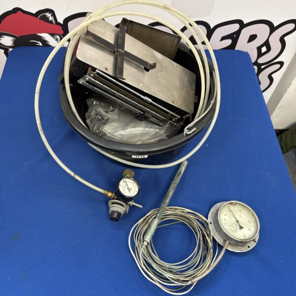 Vintage Teddington temperature gauge with coiled tubing and fittings.