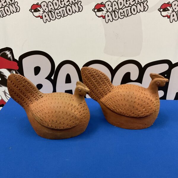 Pair of vintage terracotta chickens for farmhouse decor.
