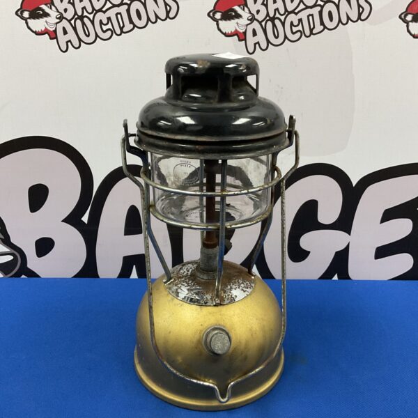 Vintage Tilley paraffin lantern with brass body and enamel top.