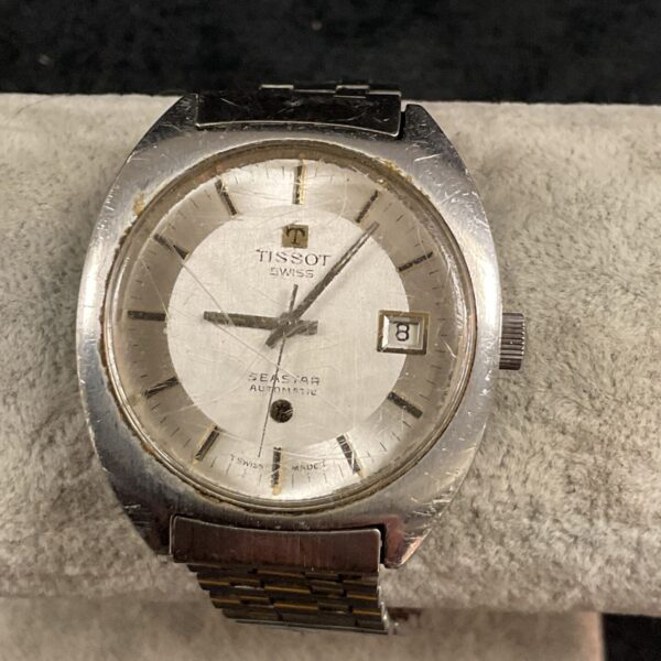 Vintage Tissot Seastar automatic watch with stainless steel bracelet.