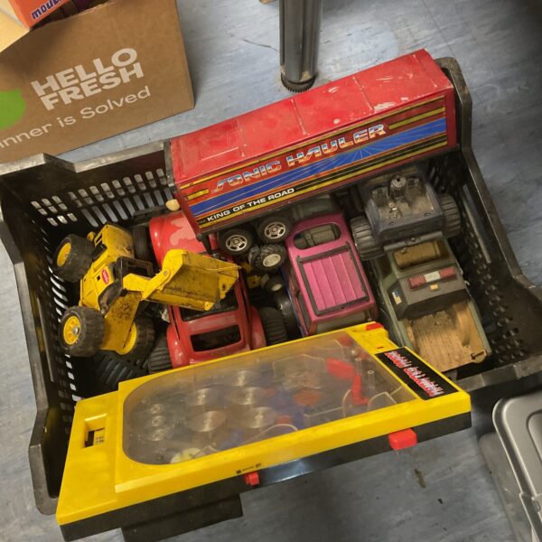 Vintage Tonka trucks lot, collectible metal toy vehicles.