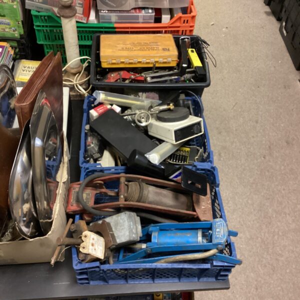 Vintage tool lot with foot pumps and cable kit.