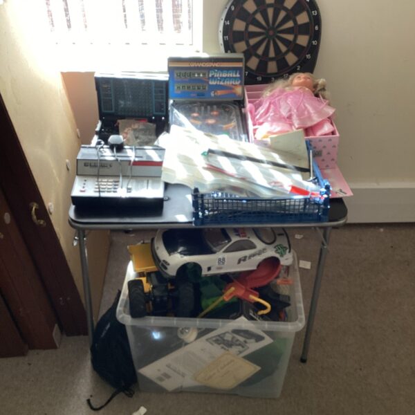 Vintage toy bundle featuring Grandstand Pinball Wizard and Battleship game.