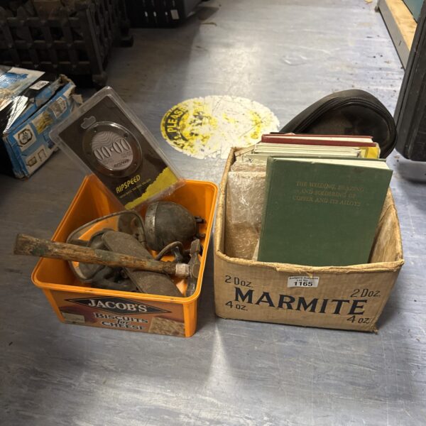 Vintage welding and soldering books with a tub of motoring items.
