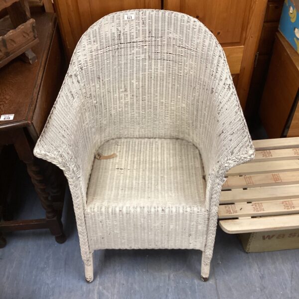 Vintage wicker chair with a classic woven design.
