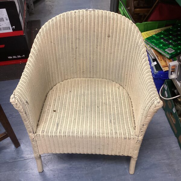 Small vintage wicker chair with a classic design.