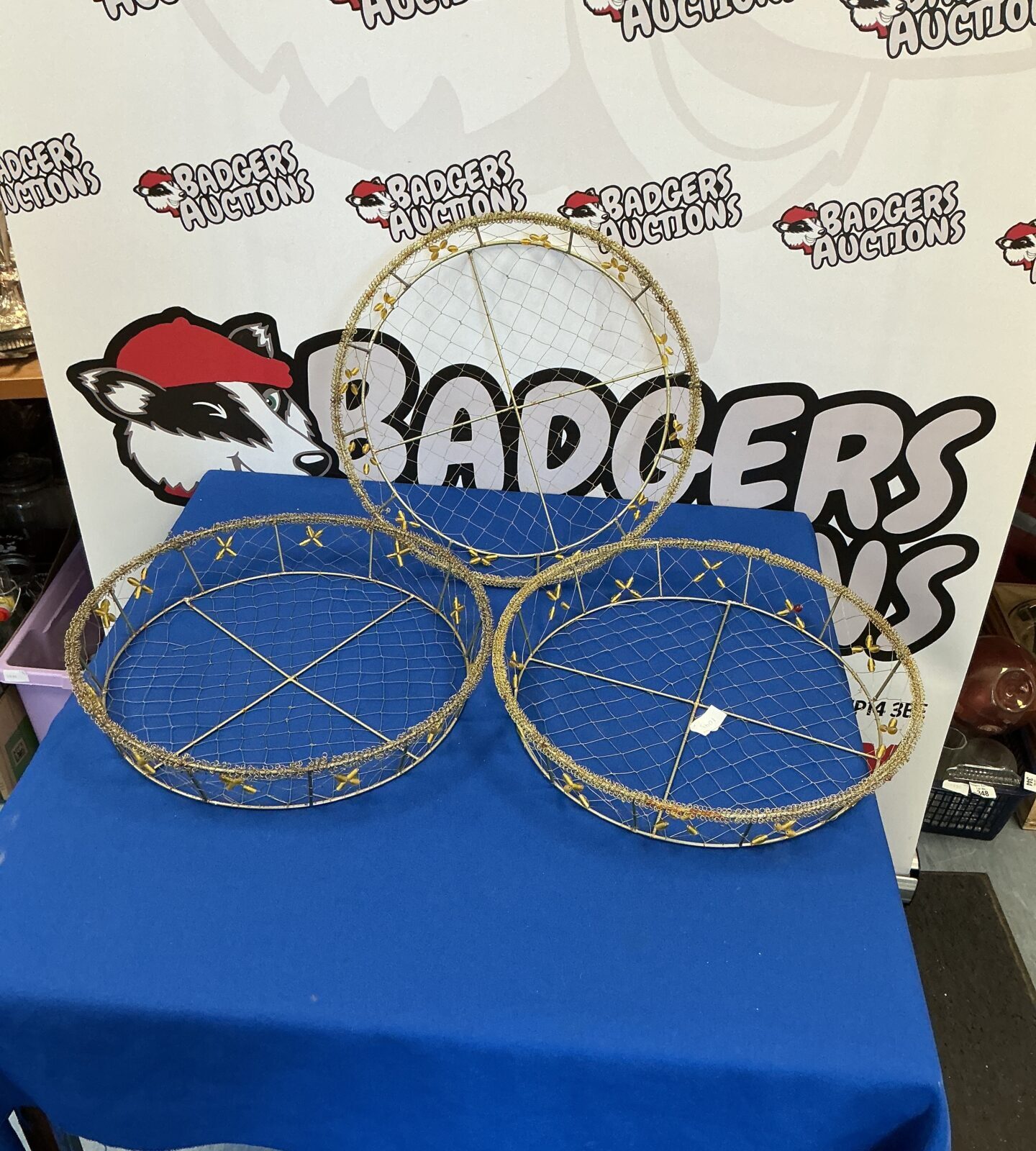 Set of three vintage wire display baskets for display or decor.