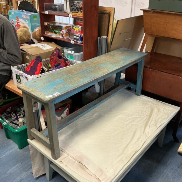 Rustic vintage wooden bench with weathered patina, ideal for farmhouse style.
