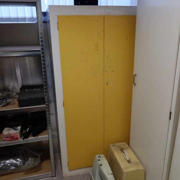 Vintage 1950s wooden cabinet for storage and display.