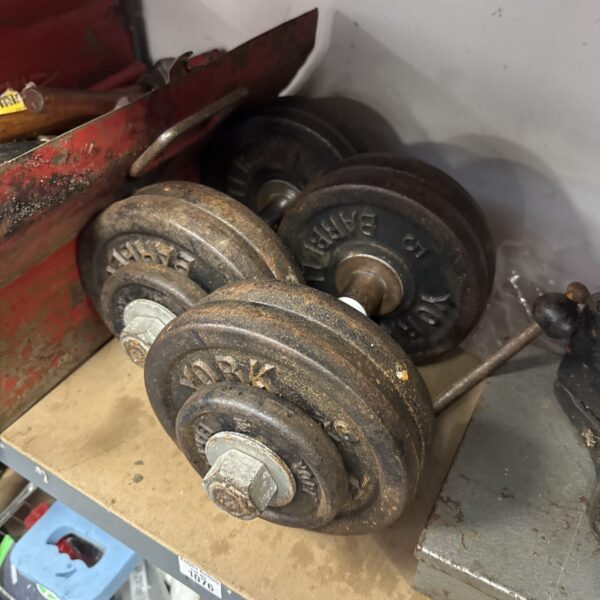 Vintage York dumbbell pair with cast iron weights.
