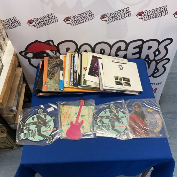 Mixed vinyl record bundle with picture discs for collectors.