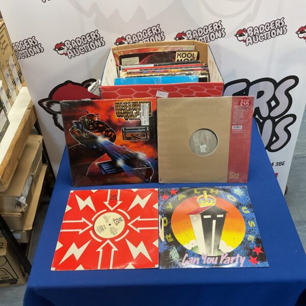 Vinyl record collection featuring 12 inch singles in various genres.