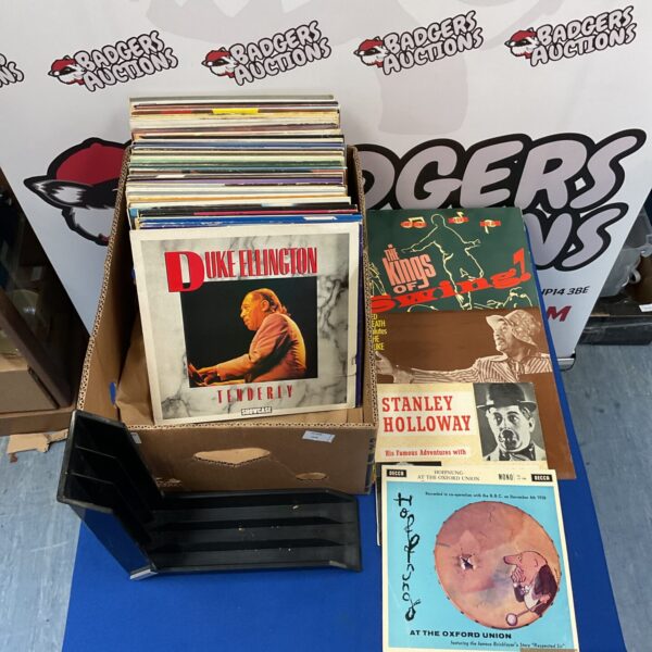 Vintage vinyl record collection featuring Duke Ellington and orchestra records.