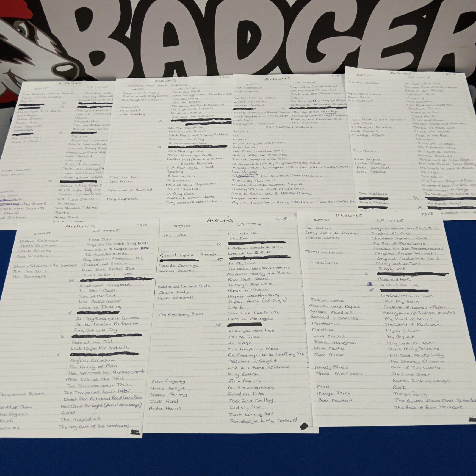 Close-up of vinyl record sleeves showing various artists and titles.