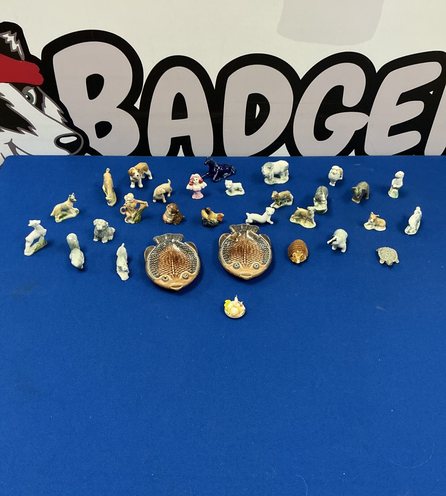 Large collection of vintage Wade Wimsey figurines, colourful miniature animals.