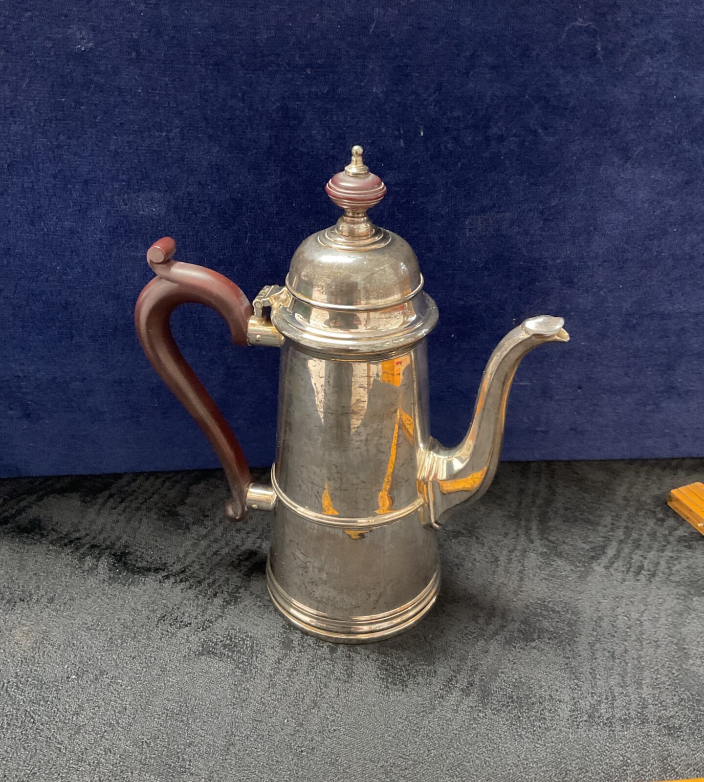 Antique silver Queen Anne coffee pot by Walker and Hall.