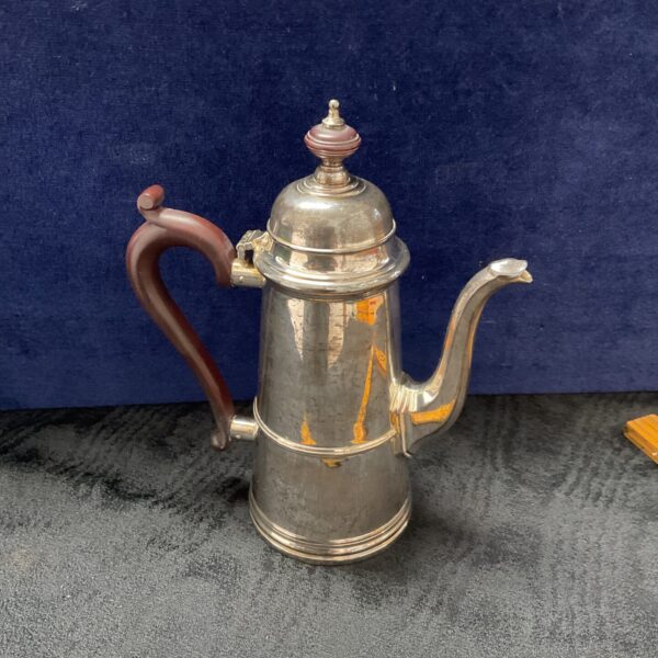 Antique silver Queen Anne coffee pot by Walker and Hall.