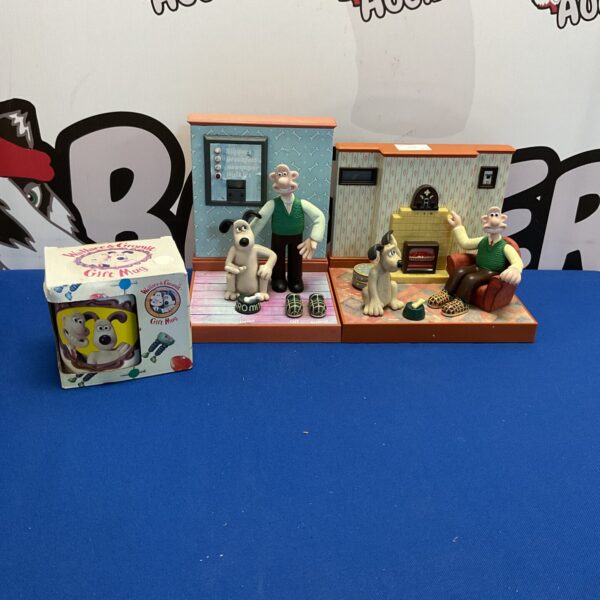 Retro Wallace and Gromit Wesco alarm clocks, collectible character merchandise.