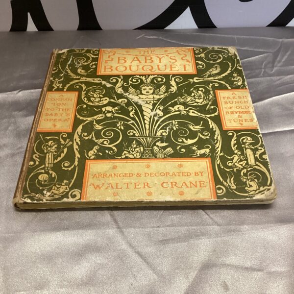 Antique *Babies Bouquet* book cover by Walter Crane, Victorian nursery rhymes.
