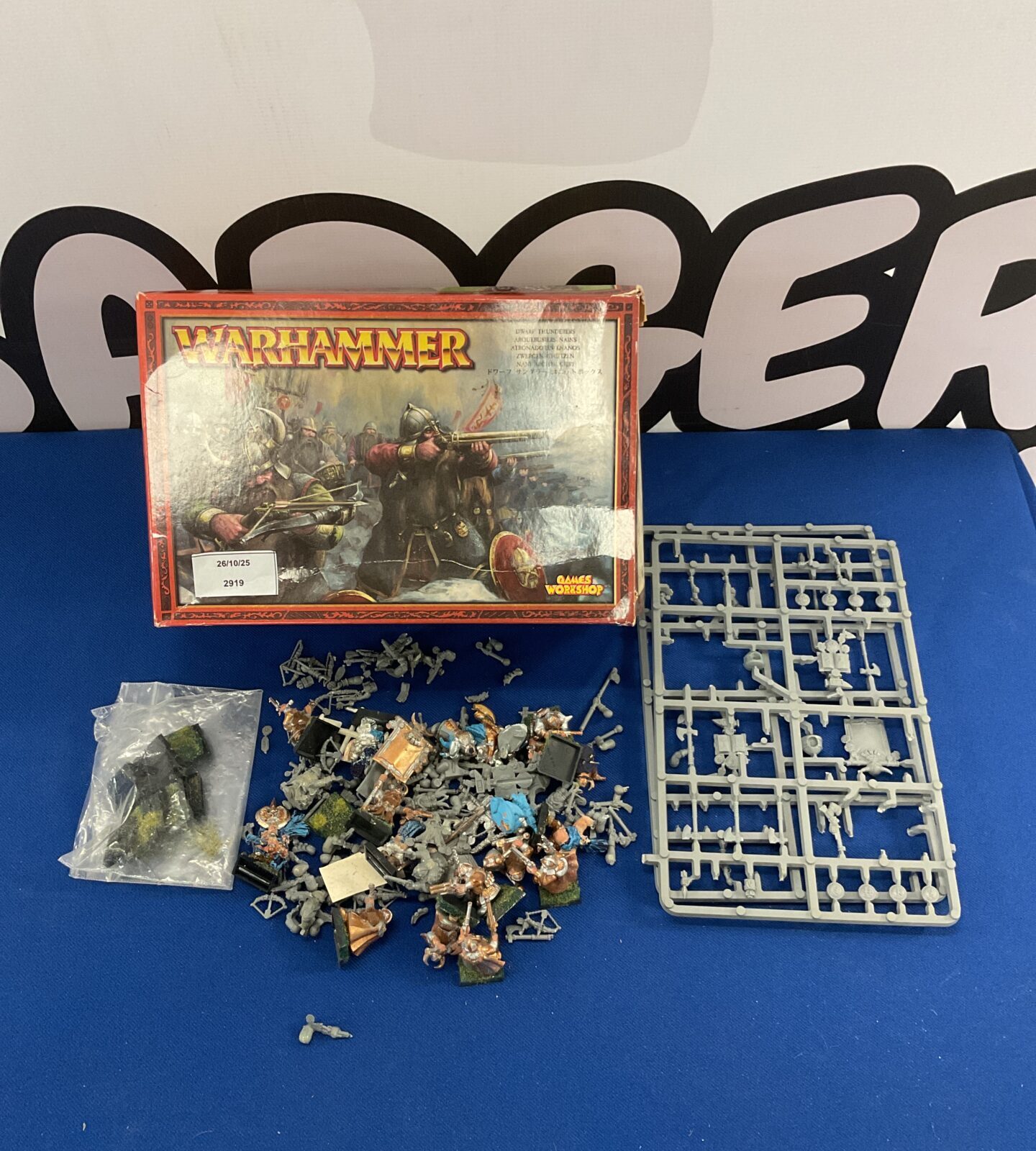 Warhammer Dwarf Thunderers box with miniatures inside.