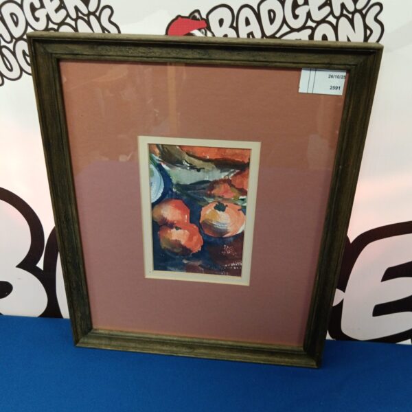 Vintage watercolour painting of a fruit still life in a frame.