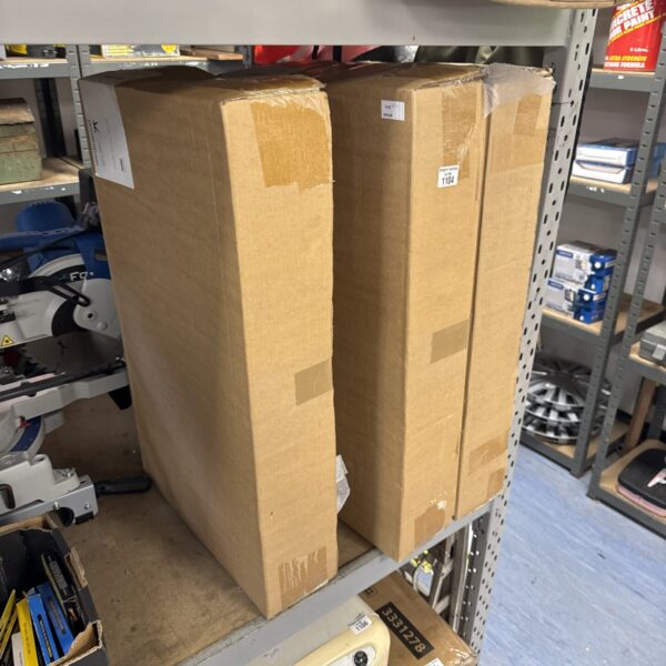 Stack of three new we do wood geo tables in green boxes.
