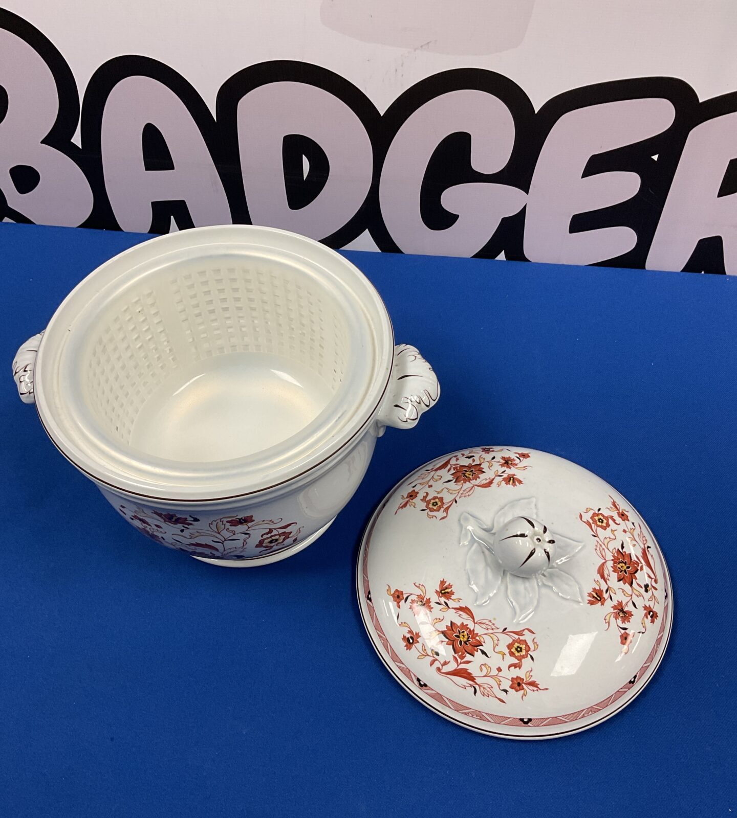 Front view of a vintage Wedgwood Kashmar ice bucket with lid.