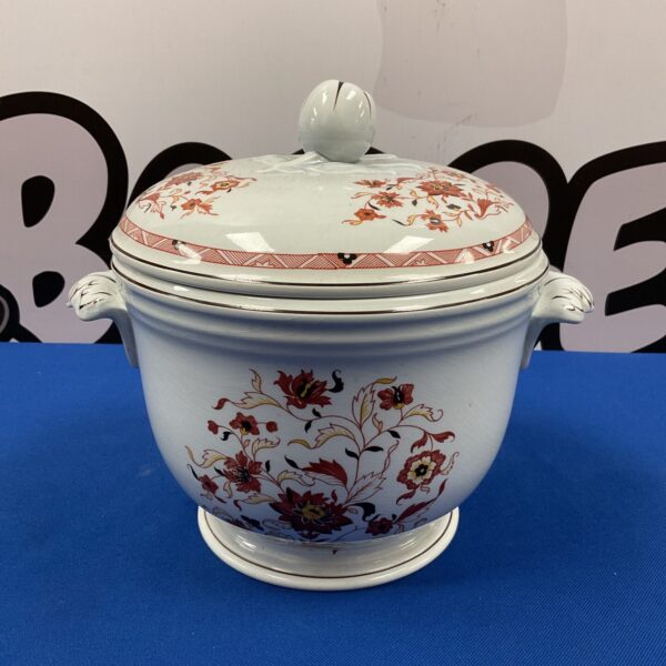 Side view of a vintage Wedgwood Kashmar ice bucket with floral design.