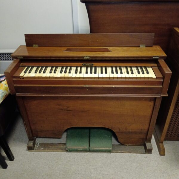 Vintage W.K. Wheatley Evesham campaign organ with keyboard and bellows.