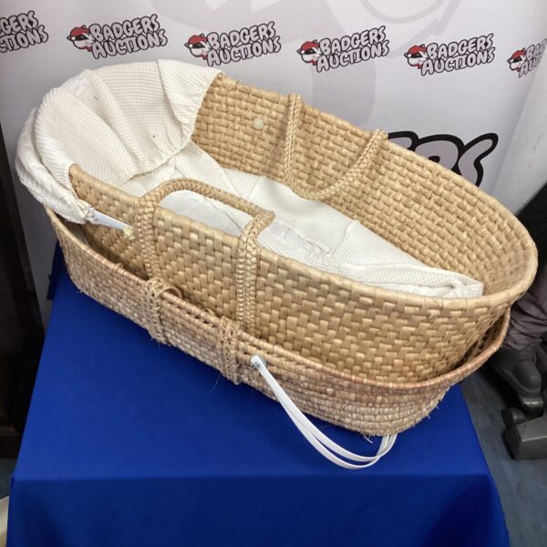 Pair of vintage wicker Moses baskets for nursery decor.
