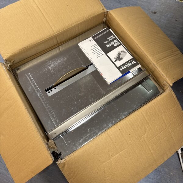 Wickes 550w electric tile cutter in original packaging, unused condition.