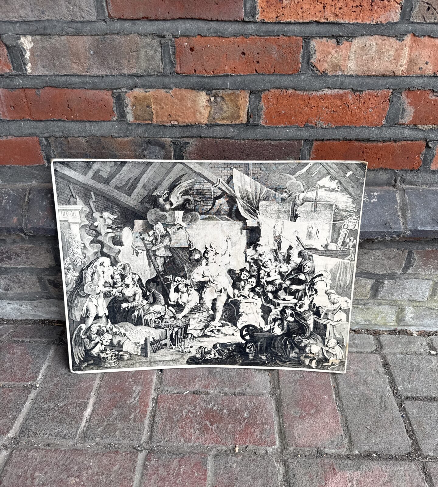 Vintage William Hogarth print of the Company of Strollers theatrical scene.