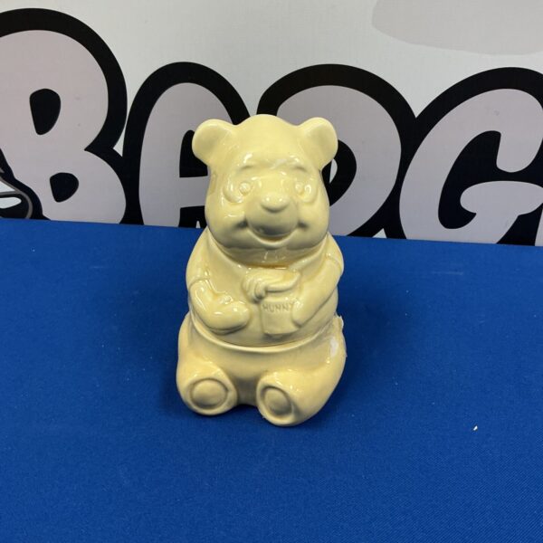 Vintage Disney Winnie the Pooh ceramic cookie jar for collectors.