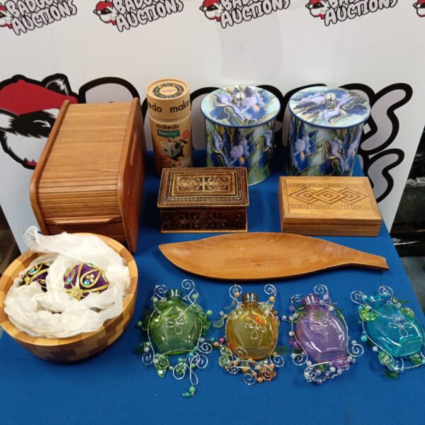 Mixed lot of vintage wooden boxes and colourful glass bottles.