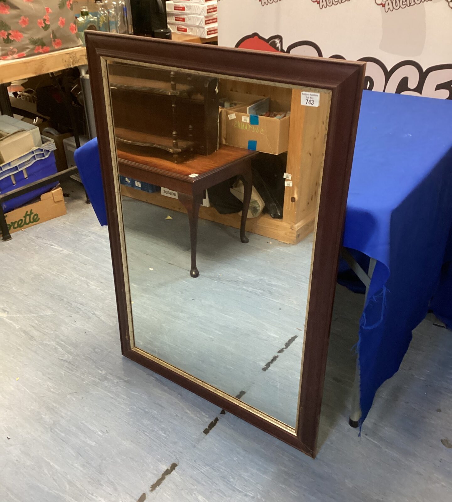 Vintage wooden framed mirror measuring 29” x 41” for wall decor.