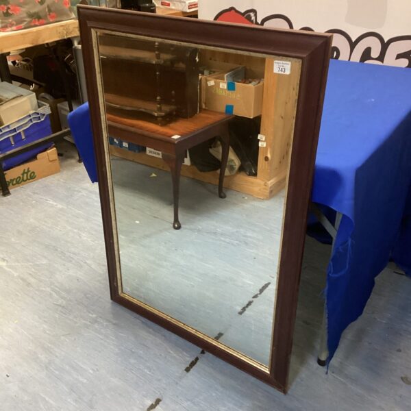 Vintage wooden framed mirror measuring 29” x 41” for wall decor.