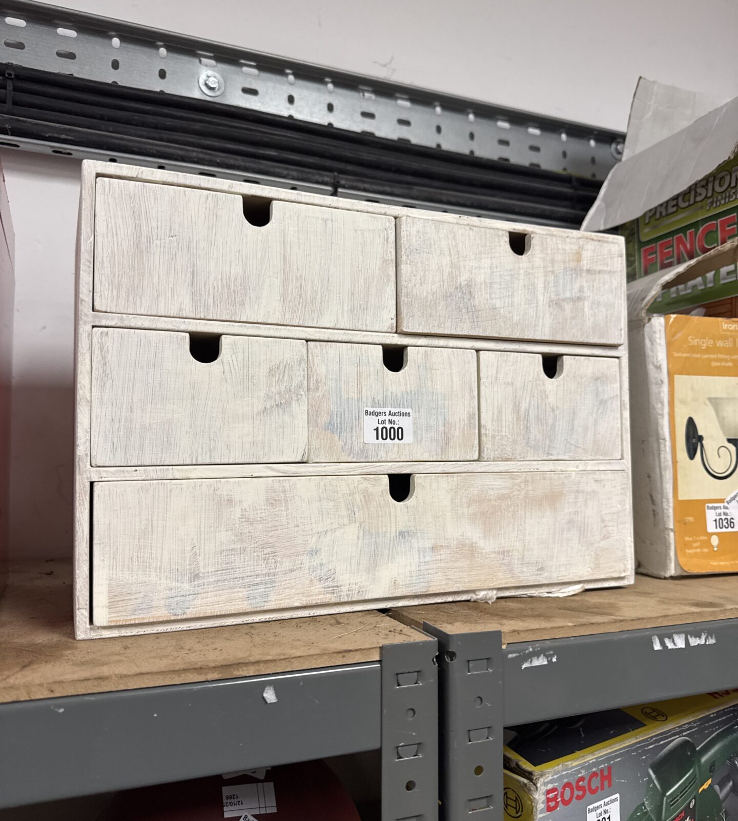 Vintage wooden hobbyist storage cabinet with multiple drawers.
