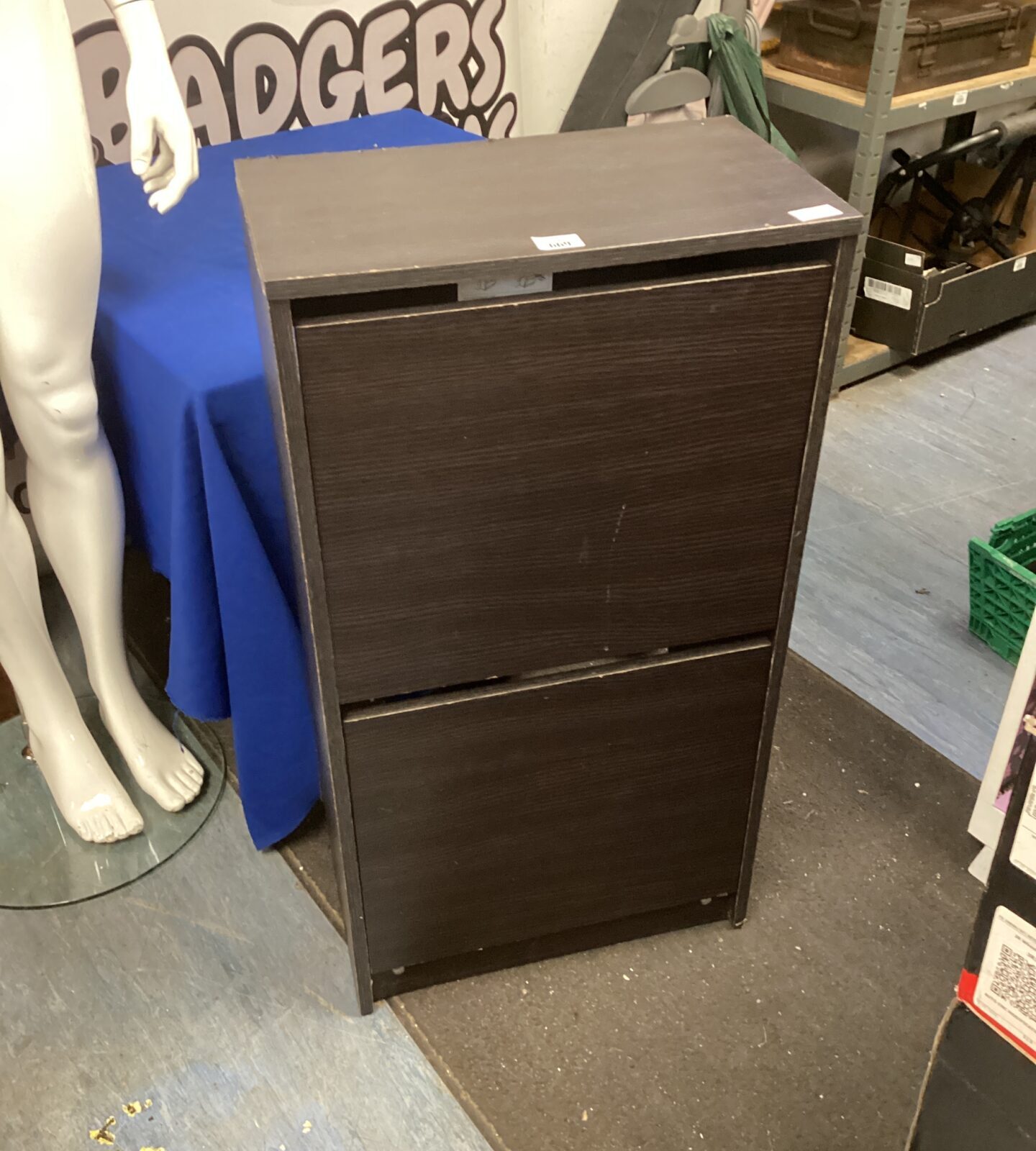 Wooden shoe rack cabinet for hallway storage and organisation.