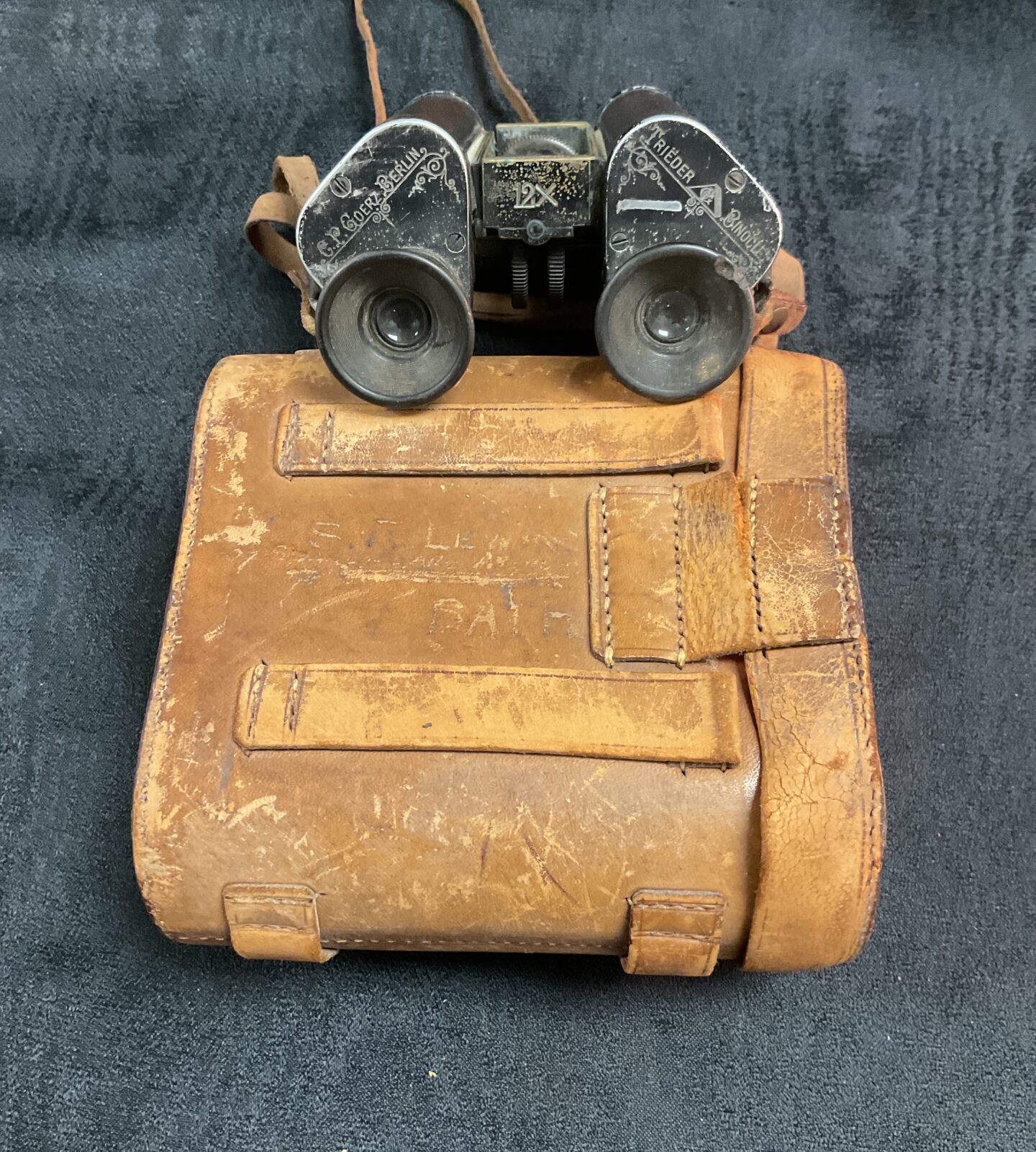 Detailed view of antique WWI Goerz Berlin binoculars.