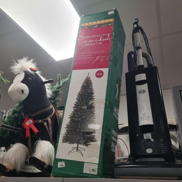 Wyevale Garden Centres slim evergreen spruce tree in original packaging.