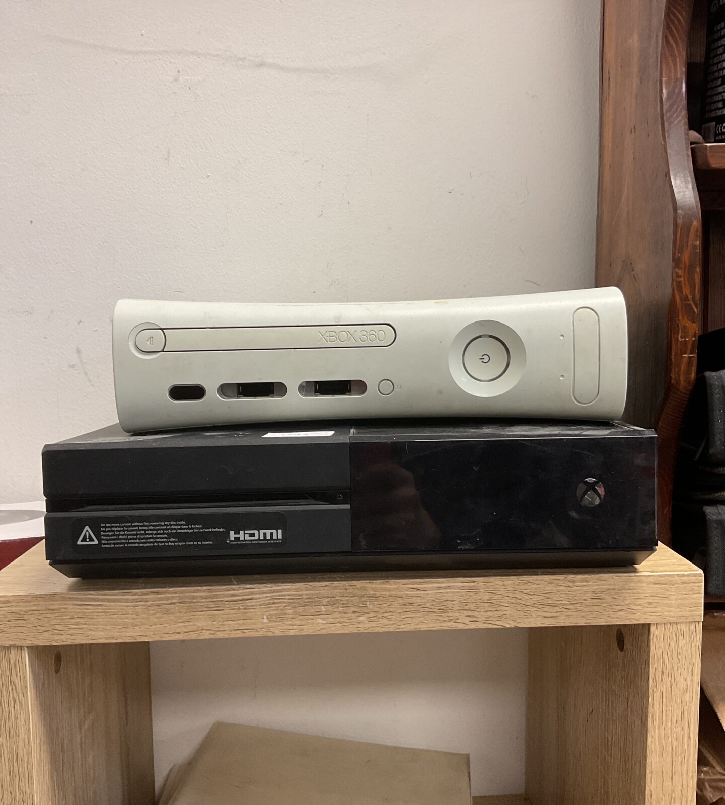 Black Microsoft Xbox 360 E gaming console for retro gaming.
