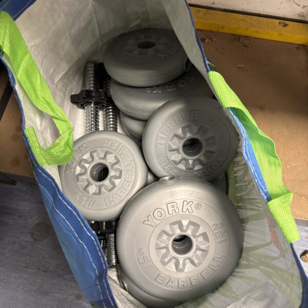 Pair of York vinyl dumbbells in a storage bag.